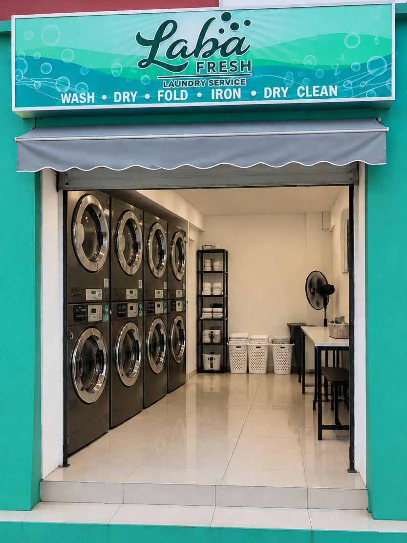 The teal Laba Fresh storefront with its Wash, Dry, Fold, Iron and Dry Clean sign